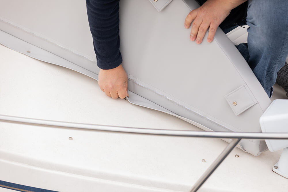 Our marine cushion snaps to the fiberglass bow of your boat.